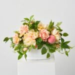 Feeling Peachy Queen - Peach Peonies & Roses, Real Touch Green Salal Leaf, Yellow Pink Ranunculus & Fuzzy Peaches Spring Summer Centerpiece Arrangement in White Concrete Oval Pot - Image 3