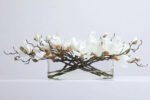 White or Fuchsia Magnolia Blooms Floral Centerpiece Water Illusion Arrangement in Oval Vase - Image 7