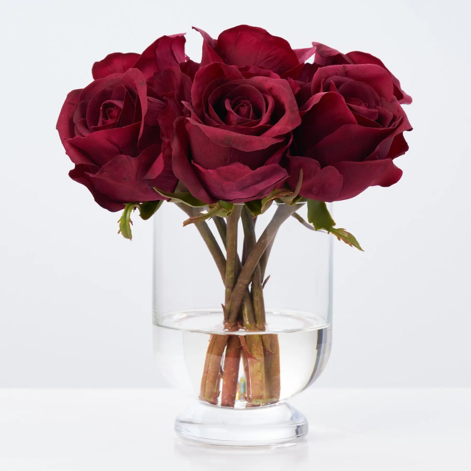 FAR1324RealTouchRedBordeauxRoseBudsInFootedUrnWaterIllusionArrangement_2 Real Touch Red Bordeaux Rose Buds In Footed Urn Water Illusion Arrangement - Image 1