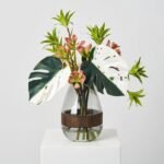 Tropical Muse - Green Albino Monstera Leaf, Dracaena & Succulent in Smoke Wood Vase Everyday Water Illusion Centerpiece Arrangement