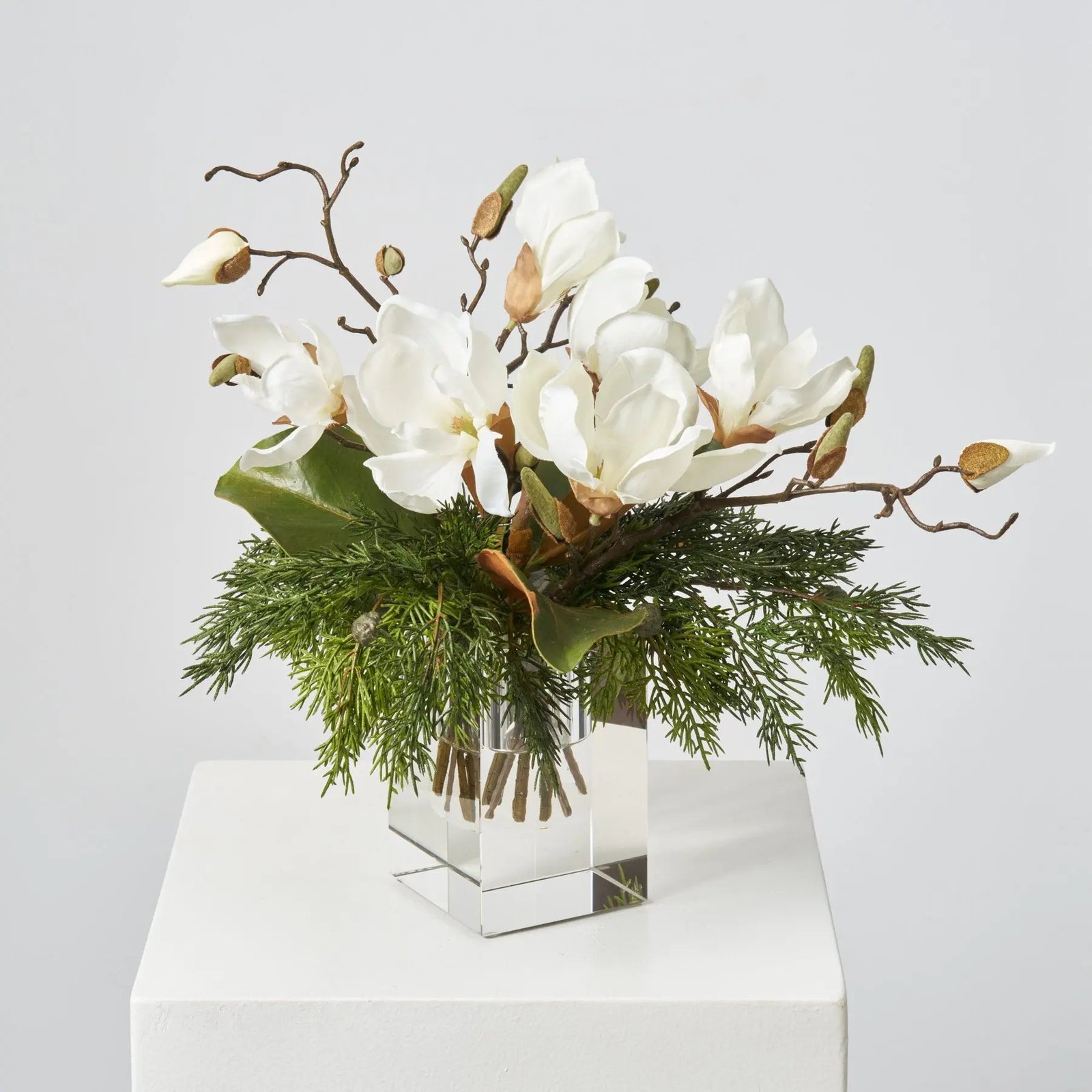 FAR1598LifelikeCedar_MagnoliaLeafBloomBranchinSquareCrystalCutCubeVaseChristmasHolidayCenterpieceWat_1 Lifelike Cedar, Magnolia Leaf Bloom Branch in Square Crystal Cut Cube Vase Christmas Holiday Centerpiece Water Illusion Arrangement - Image 1