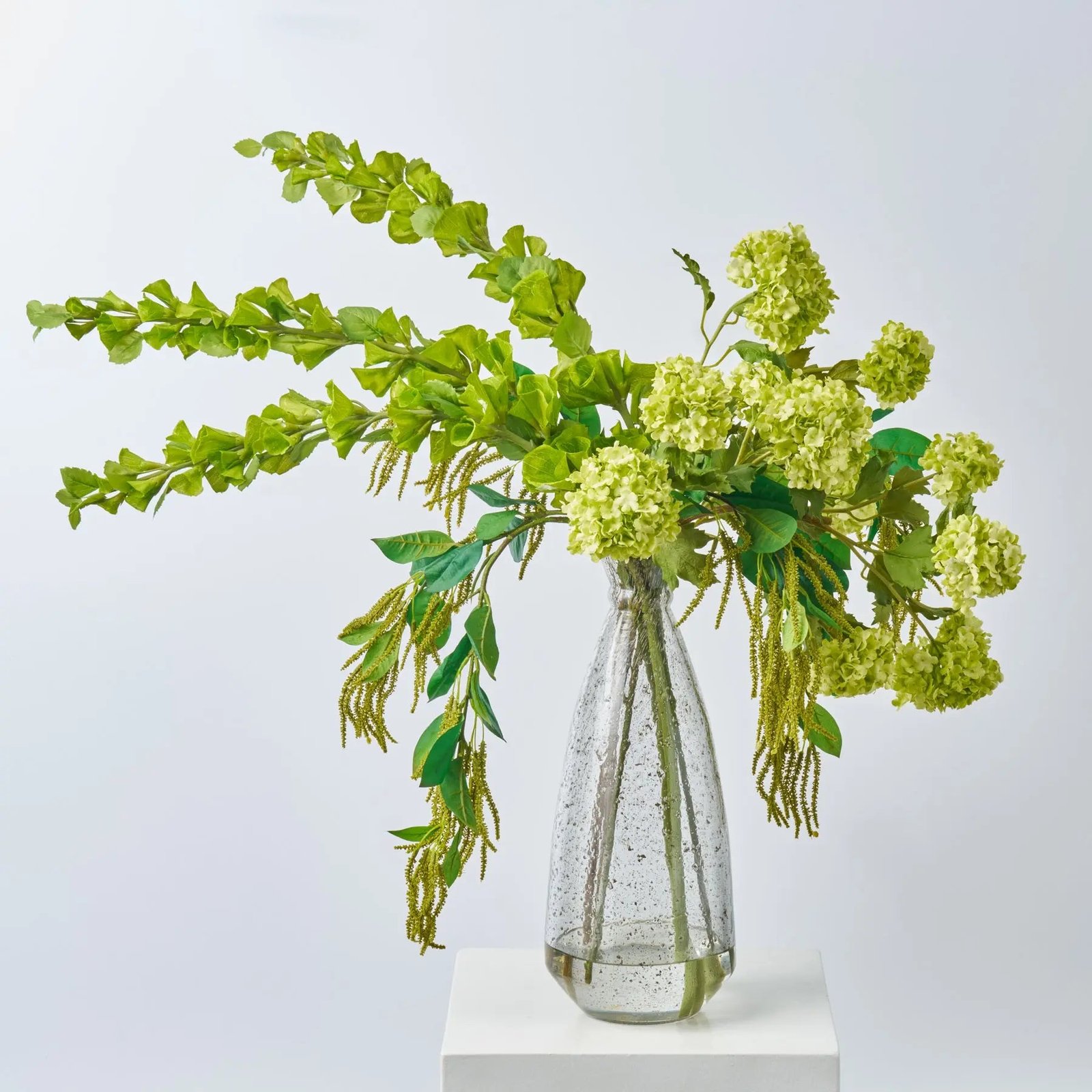 FAR1629ChlorophyllCantilever-BellsofIreland_SnowballBlooms_AmaranthusinExtraTallRecycledGlassVaseLargeTa_1 Chlorophyll Cantilever - Bells of Ireland, Snowball Blooms & Amaranthus in Extra Tall Recycled Glass Vase Large Table Arrangement Water Illusion - Image 1