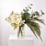 The Christmas Orchid - Cream Cymbidium Blooms, Real Touch Cedar & Botanical Eucalyptus Holiday Water Illusion Centerpiece Arrangement - Image 3