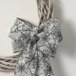 White Washed Wicker Willow Wreath with Black & Grey Canvas Spiderweb Halloween Bow - Image 2