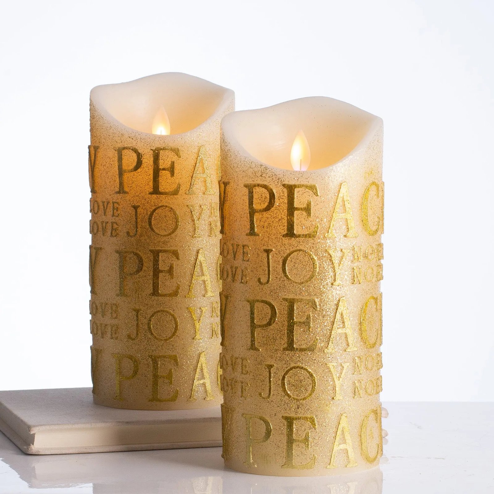HMD1346GoldGlitterPeace_JoyFlickerFlameBattery-OperatedLEDPillarCandles_5 Gold Glitter Peace & Joy Flickering Flameless Battery-Operated LED Pillar Candles - Image 1