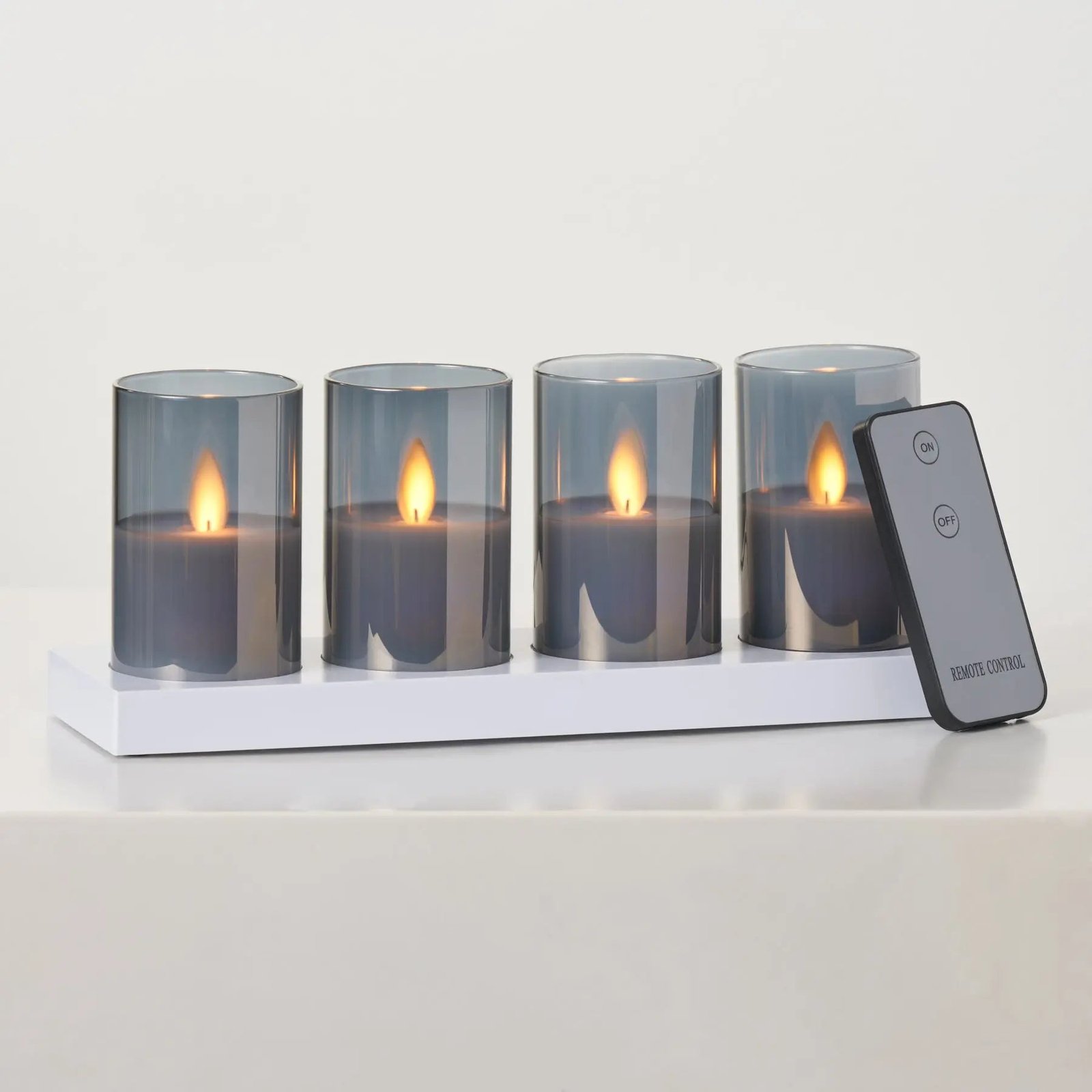 HMD1531-Smoke_6_MovingFlamelessLEDSmokeGlassRechargeableVotiveCandleswithRemote-Set Rechargeable Smoke Glass Moving Flameless LED Votive Candles with Remote - Set of 4 - Image 1
