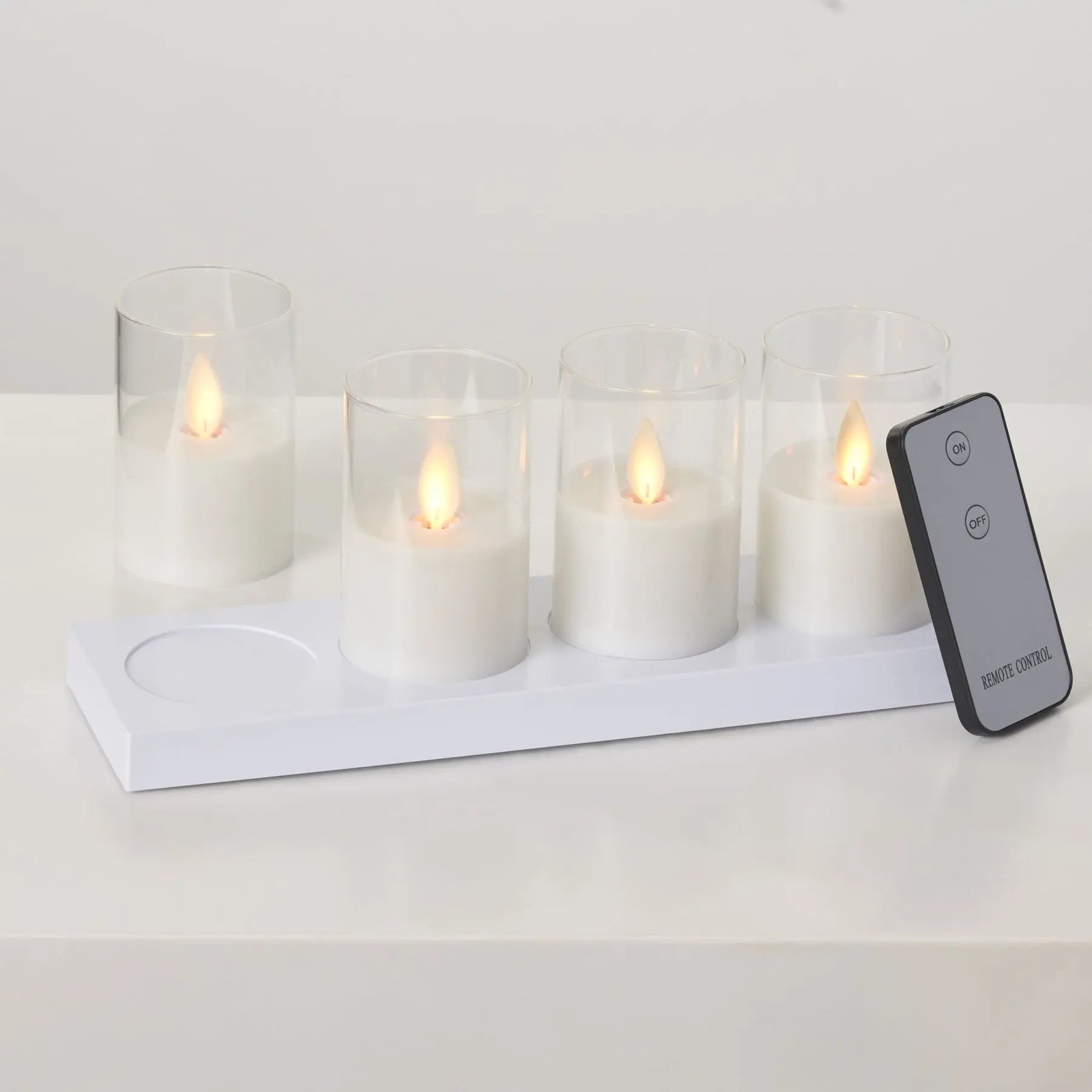MovingFlamelessLEDCreamGlassRechargeableVotiveCandleswithRemote-Setof4HMD1531_2 Moving Flameless LED White Glass Rechargeable Votive Candles with Remote - Set of 4 - Image 1