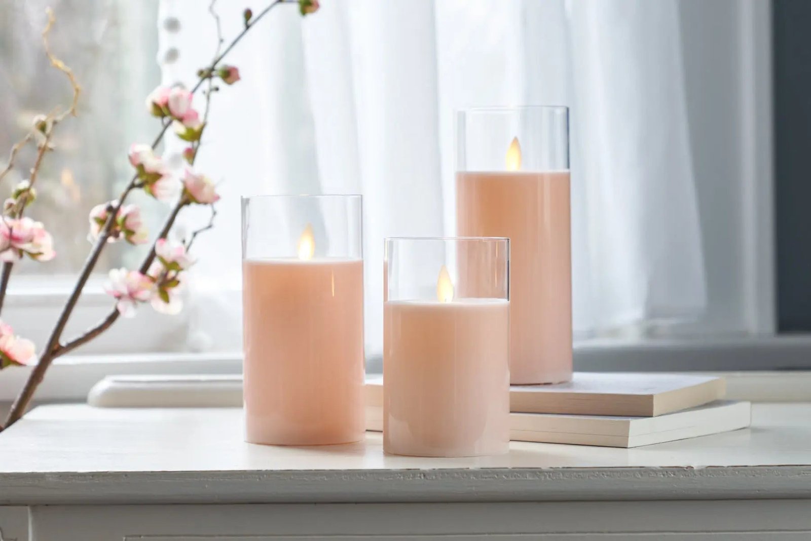 MovingFlamelessLEDPinkGlassPillarCandleswithRemote-Setof3HMD1502 Moving Flameless LED Pink Glass Pillar Candles with Remote - Set of 3 - Image 1