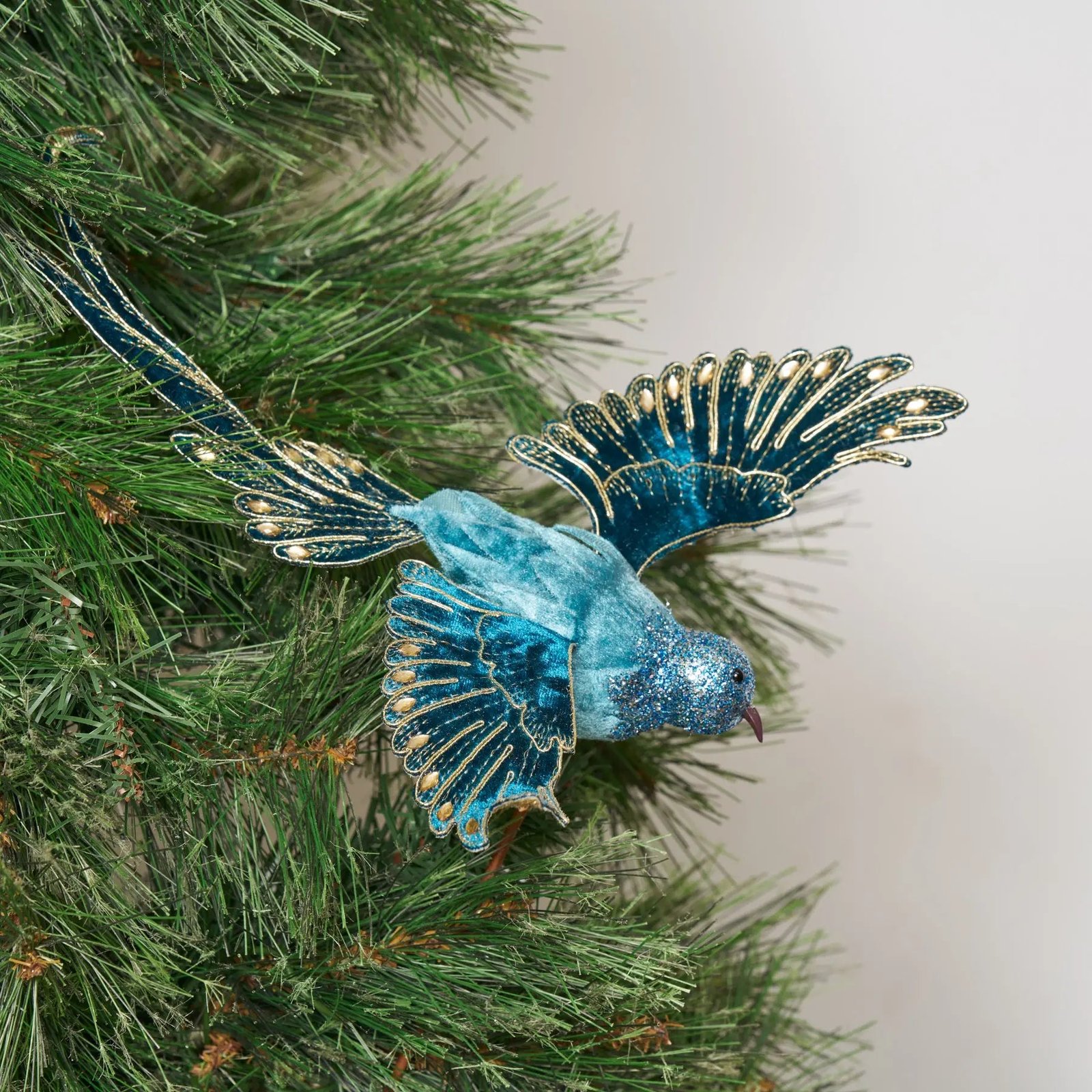 ORNAM1391BlueVelvetHolidayHummingbirdwithGoldMetallicGlitterDetailingChristmasOrnamentonPick Blue Velvet Holiday Hummingbird with Gold Metallic Glitter Detailing Christmas Ornament on Pick - Image 1
